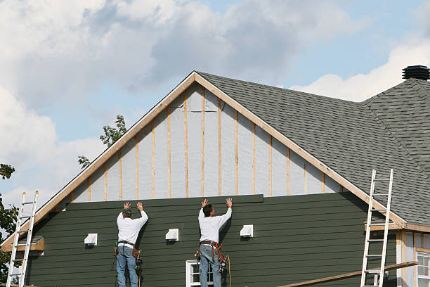 Professional Siding Installation technician working in Zebulon, GA